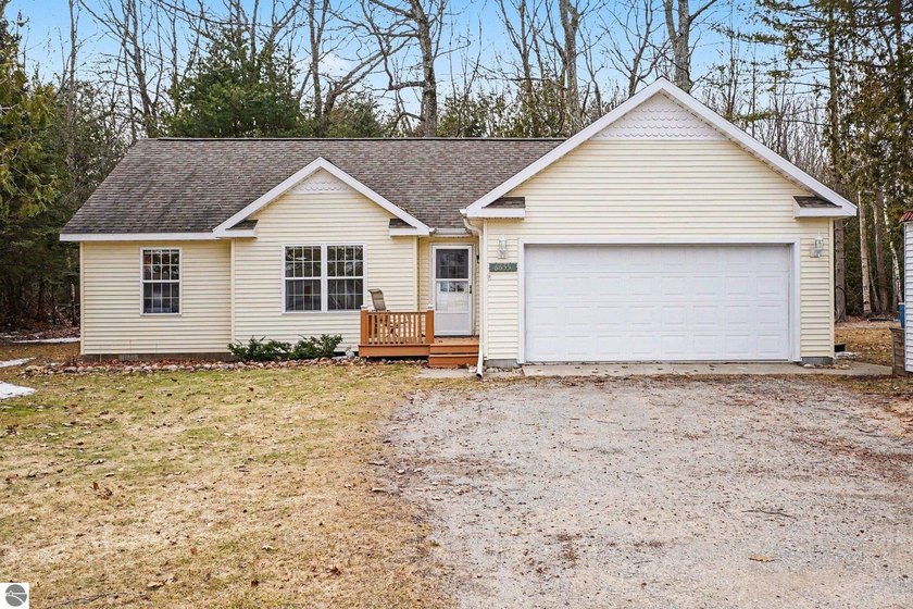 Wonderful on Woodlea!  Discover the charm of this serene retreat - Beach Home for sale in Oscoda, Michigan on Beachhouse.com