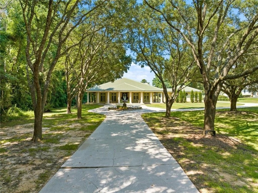 Discover this lovely Mediterranean-style home, conveniently - Beach Home for sale in Fairhope, Alabama on Beachhouse.com