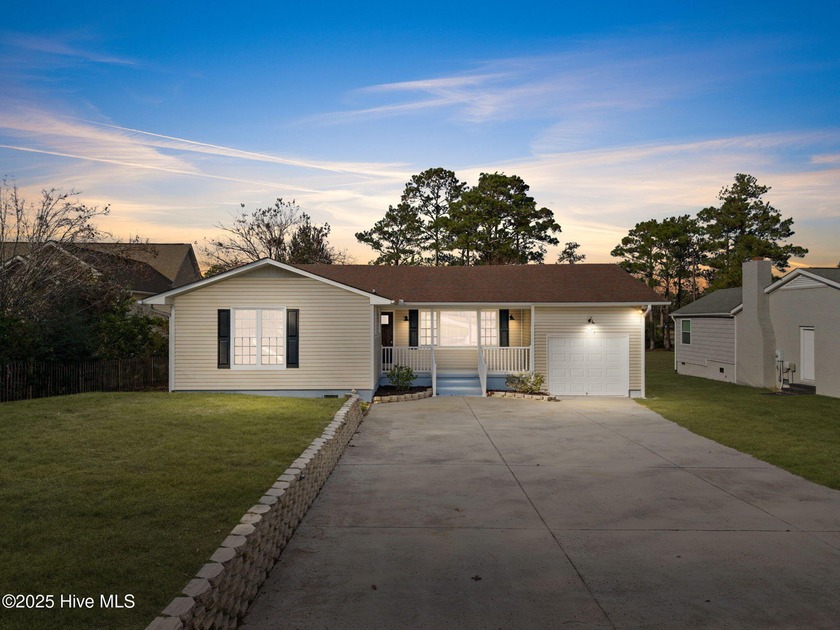 Welcome to 821 S Shore Drive, a charming lakeside retreat tucked - Beach Home for sale in Southport, North Carolina on Beachhouse.com