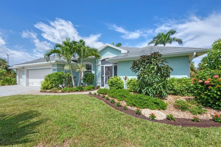 Welcome to your private slice of coastal paradise - A true lush - Beach Home for sale in Port Charlotte, Florida on Beachhouse.com