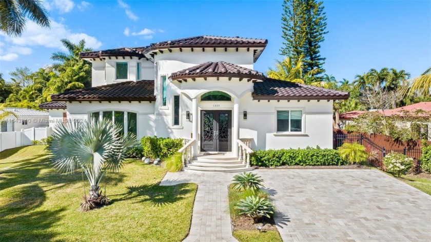 Step into this Mediterranean oasis. Greeted by 24ft ceilings - Beach Home for sale in Hollywood, Florida on Beachhouse.com
