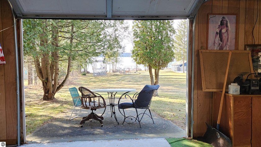 TORCH LAKE IS THE SETTING FOR THIS 36' x 36' GARAGE WITH 12' x - Beach Lot for sale in Alden, Michigan on Beachhouse.com