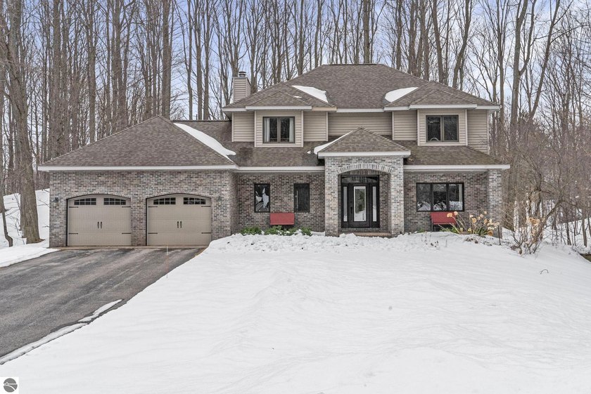 This bright, spacious two-story turnkey home with a walkout - Beach Home for sale in Traverse City, Michigan on Beachhouse.com