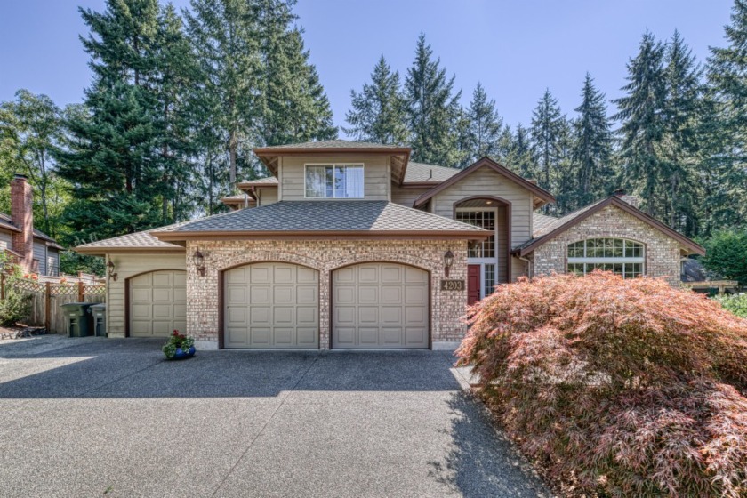This gorgeous 3 bedroom, 3 bath home sits nestled in exceptional - Beach Home for sale in Gig Harbor, Washington on Beachhouse.com