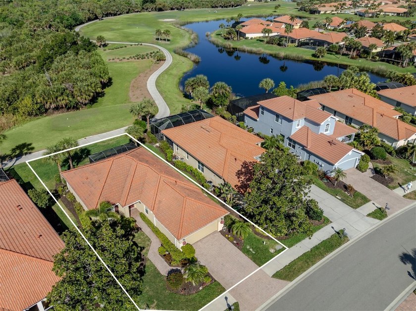 In the golfing community of Venetian Golf & River Club, this - Beach Home for sale in Venice, Florida on Beachhouse.com