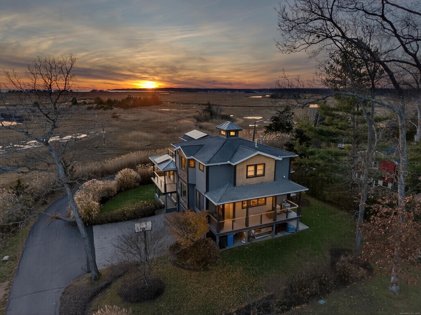 Prepare to be captivated by this sun-soaked, updated - Beach Home for sale in Madison, Connecticut on Beachhouse.com
