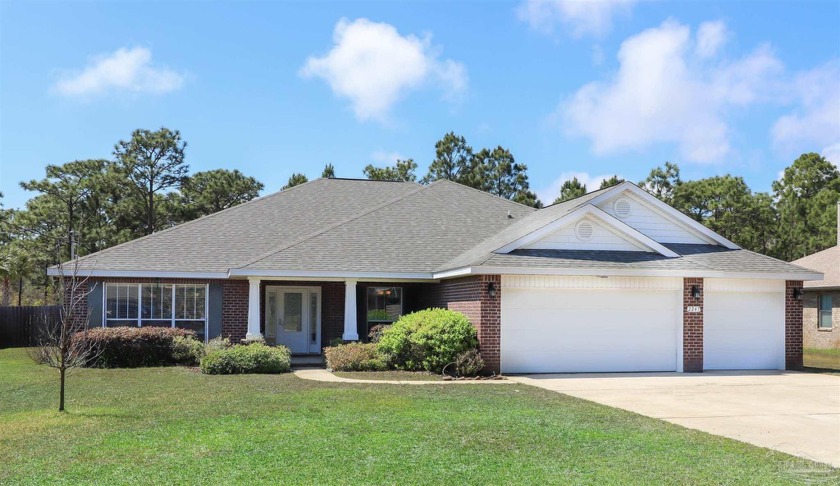 This beautiful brick home is located in the sought-after Holley - Beach Home for sale in Navarre, Florida on Beachhouse.com