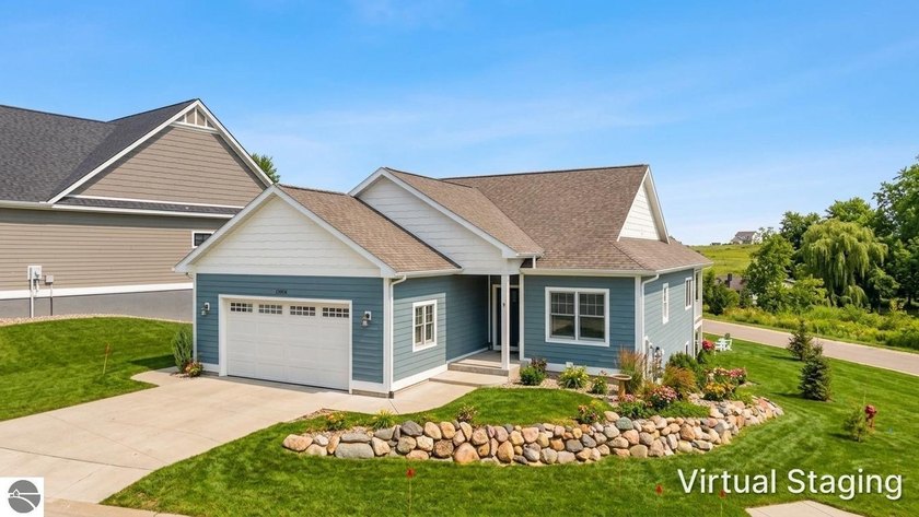 Crisp, current, and built to impress, this stunning ranch - Beach Home for sale in Traverse City, Michigan on Beachhouse.com