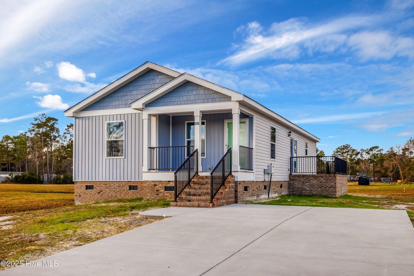 Discover simple coastal living at 936 Willow Place SW. This - Beach Home for sale in Calabash, North Carolina on Beachhouse.com