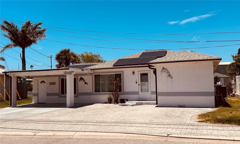 JUST IMAGINE--- YOUR VERY OWN Waterfront 3 bedroom/2 bath home - Beach Home for sale in Madeira Beach, Florida on Beachhouse.com