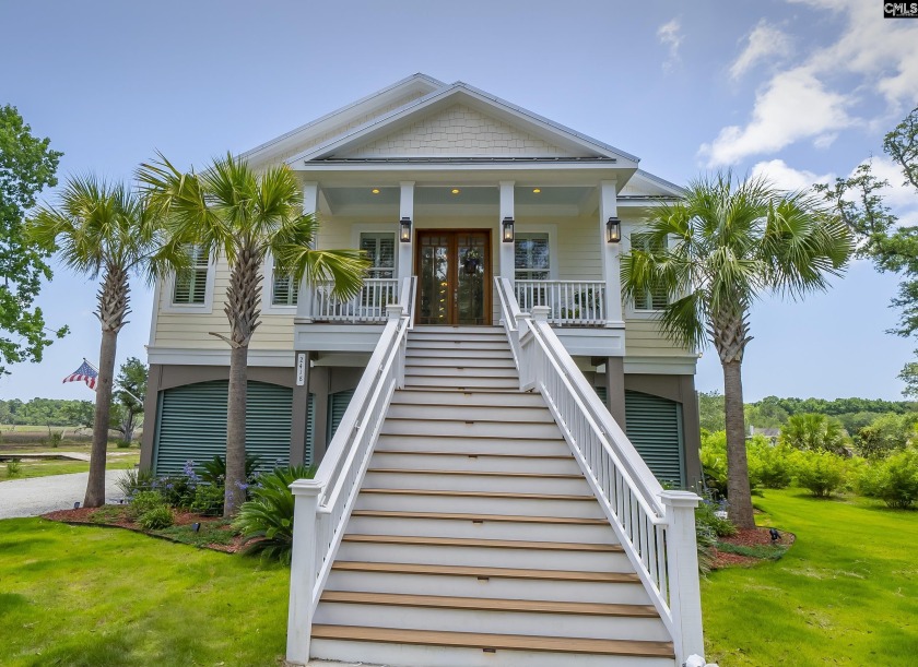 Welcome home to this custom-built coastal home overlooking the - Beach Home for sale in Edisto Island, South Carolina on Beachhouse.com