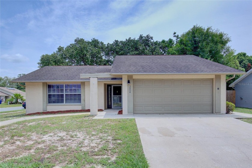 Welcome to your dream home! Nestled on a generous corner lot - Beach Home for sale in New Port Richey, Florida on Beachhouse.com