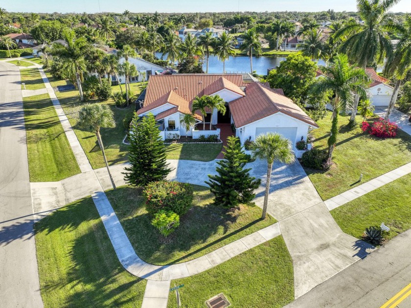 This extremely bright and expansive lakefront home in Greenview - Beach Home for sale in Wellington, Florida on Beachhouse.com