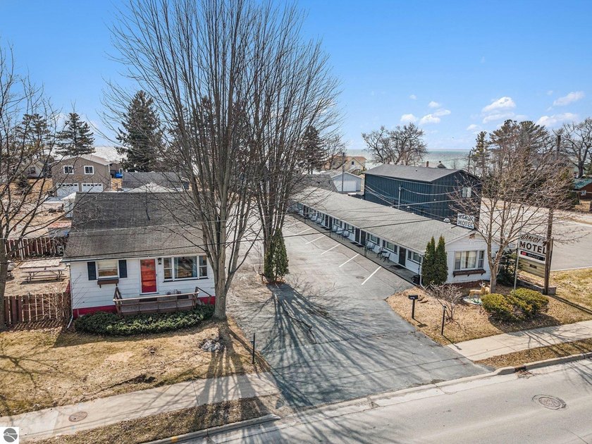 Tucked into the lively heart of East Tawas, the Bambi Motel - Beach Commercial for sale in East Tawas, Michigan on Beachhouse.com