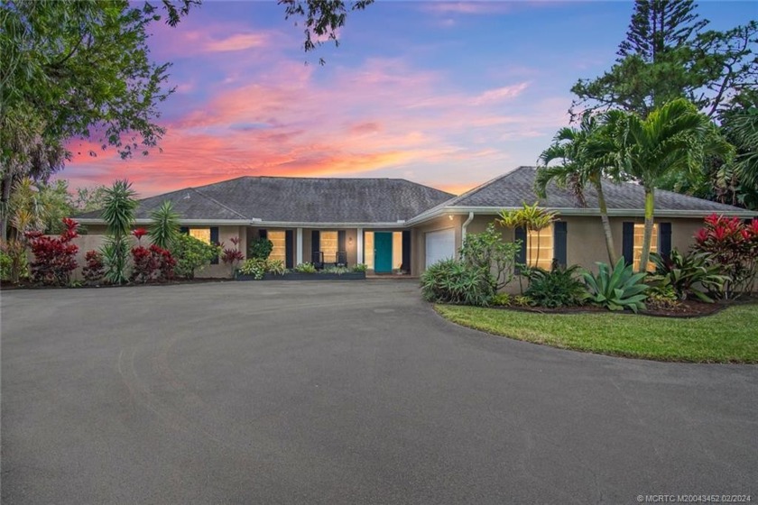 Discover this gem of a home on a 1-acre lot offering stunning - Beach Home for sale in Palm City, Florida on Beachhouse.com