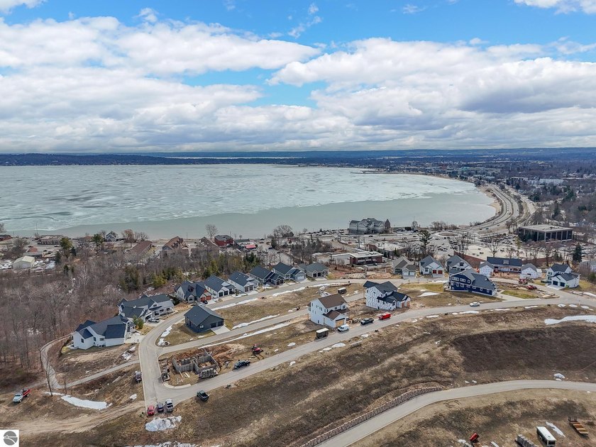 Panoramic, unobstructed views of West Grand Traverse Bay set the - Beach Lot for sale in Traverse City, Michigan on Beachhouse.com