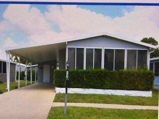 MANUFACTURED HOME OWNED LAND IN A DESIRABLE ADULT GATED - Beach Home for sale in Deerfield Beach, Florida on Beachhouse.com