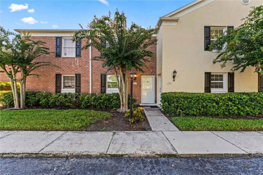 Nestled within a secure lakeside community, this condo/townhouse - Beach Condo for sale in Tampa, Florida on Beachhouse.com