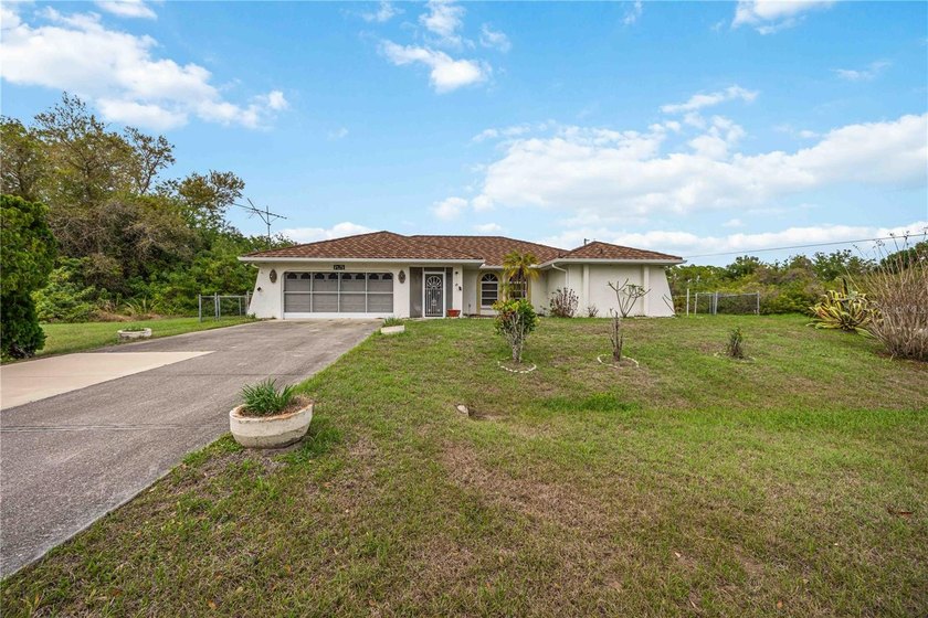 Situated on an oversized corner lot in a quiet North Port - Beach Home for sale in North Port, Florida on Beachhouse.com
