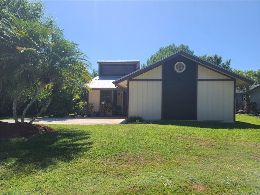 Cute waterfront home w/metal roof in South River Colony of - Beach Home for sale in Stuart, Florida on Beachhouse.com