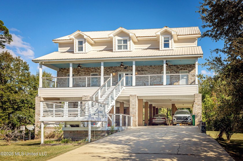 Spectacular Water Views & Boat Launch Ownership Access in Gulf - Beach Home for sale in Ocean Springs, Mississippi on Beachhouse.com