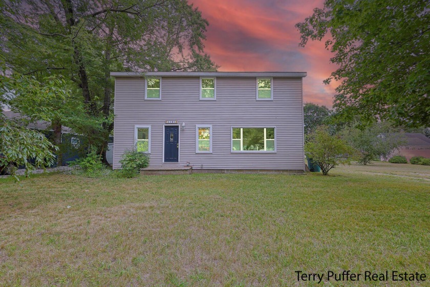 Welcome to this cozy newly redesigned home in the heart of - Beach Home for sale in Norton Shores, Michigan on Beachhouse.com