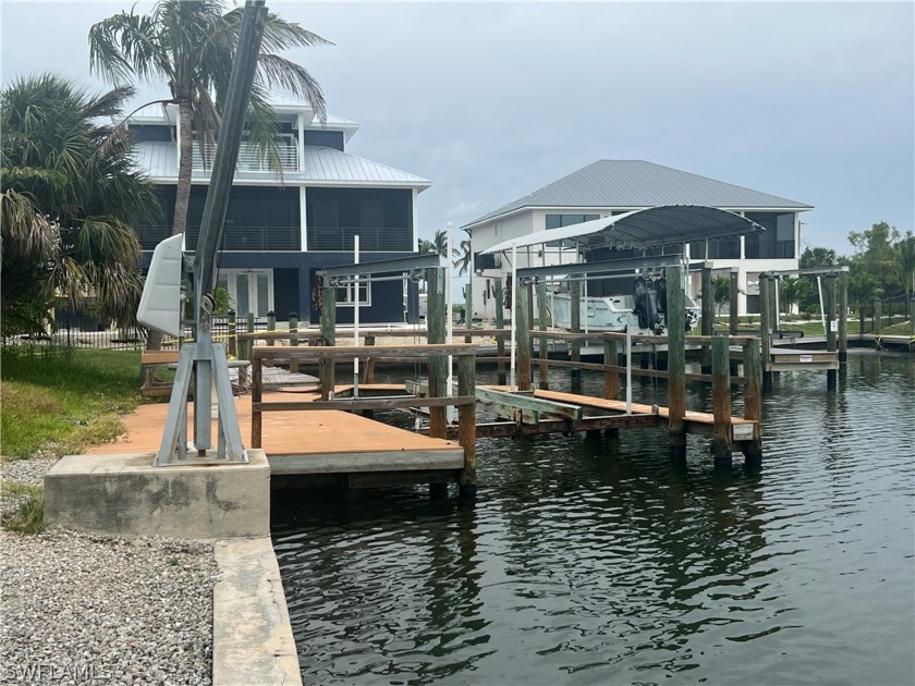 Nestled on a prized canal lot in the serene and highly desirable - Beach Home for sale in Fort Myers Beach, Florida on Beachhouse.com