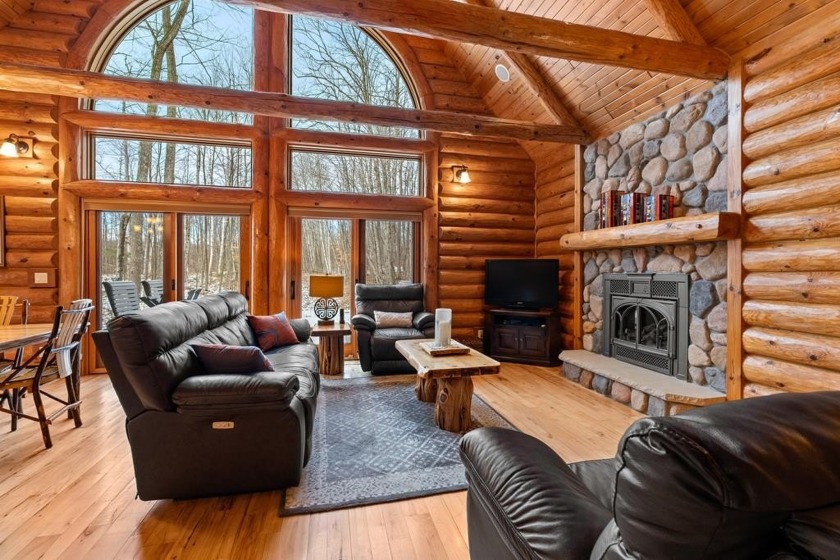 This custom-built log home offers a meticulously designed floor - Beach Home for sale in Baileys Harbor, Wisconsin on Beachhouse.com