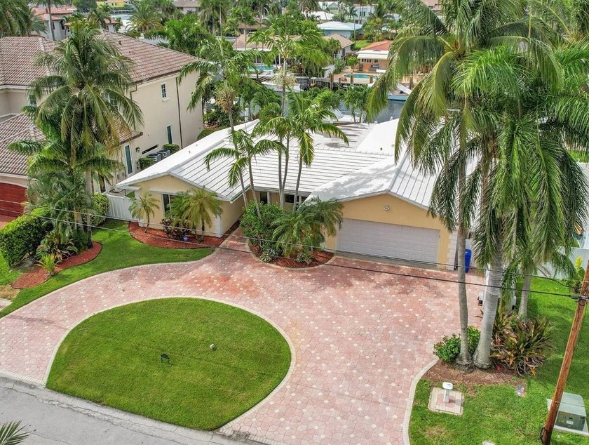 Nestled in a cul-de-sac in prestigious Hillsboro Harbor, this - Beach Home for sale in Pompano Beach, Florida on Beachhouse.com