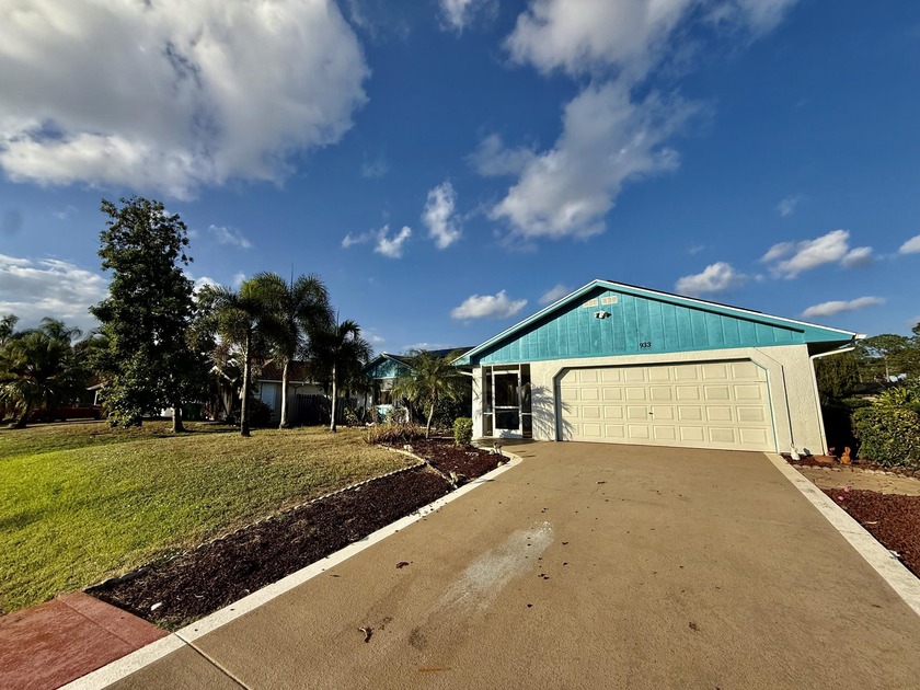 Discover the potential in this 3-bedroom, 2-bath Port St. Lucie - Beach Home for sale in Port Saint Lucie, Florida on Beachhouse.com