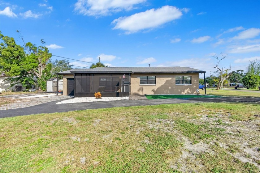 Step into this fully remodeled 3-bedroom, 2-bath corner lot home - Beach Home for sale in St. Petersburg, Florida on Beachhouse.com