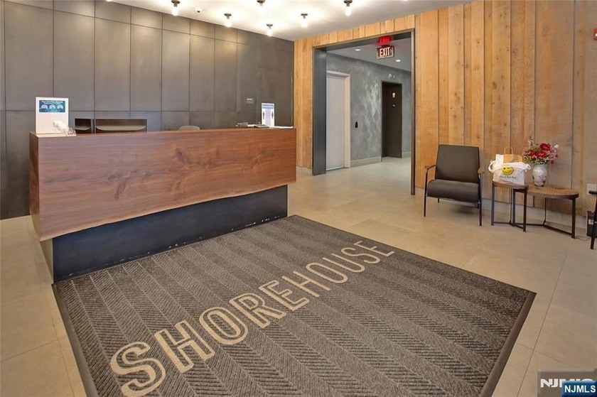 Welcome to Residence #408 at Shore House, a refined 1-bedroom - Beach Condo for sale in Jersey City, New Jersey on Beachhouse.com