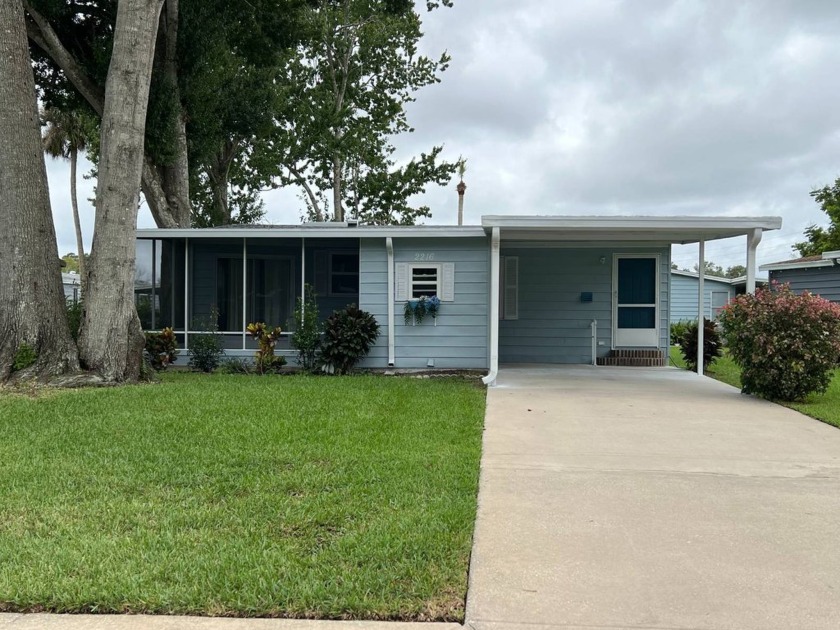 This Palm Harbor home has a roomy, open floor plan with two - Beach Home for sale in Port Orange, Florida on Beachhouse.com