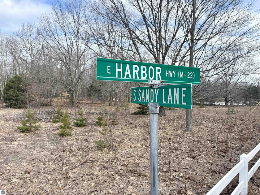 It starts with a drive down M-22, with the windows down, fresh - Beach Acreage for sale in Cedar, Michigan on Beachhouse.com