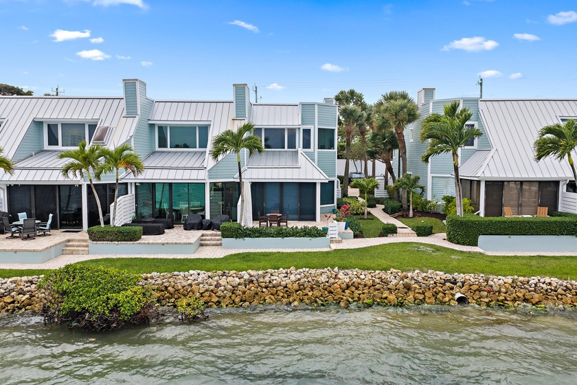Discover the charm of Key West style living in this stunning end - Beach Townhome/Townhouse for sale in Jupiter, Florida on Beachhouse.com