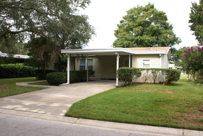 This spacious two-bedroom, two-bath home with a family room has - Beach Home for sale in Ormond Beach, Florida on Beachhouse.com