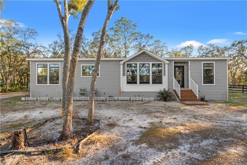 Completed in 2022, this lovely 3 bedroom, 2 bath home not only - Beach Home for sale in Homosassa, Florida on Beachhouse.com