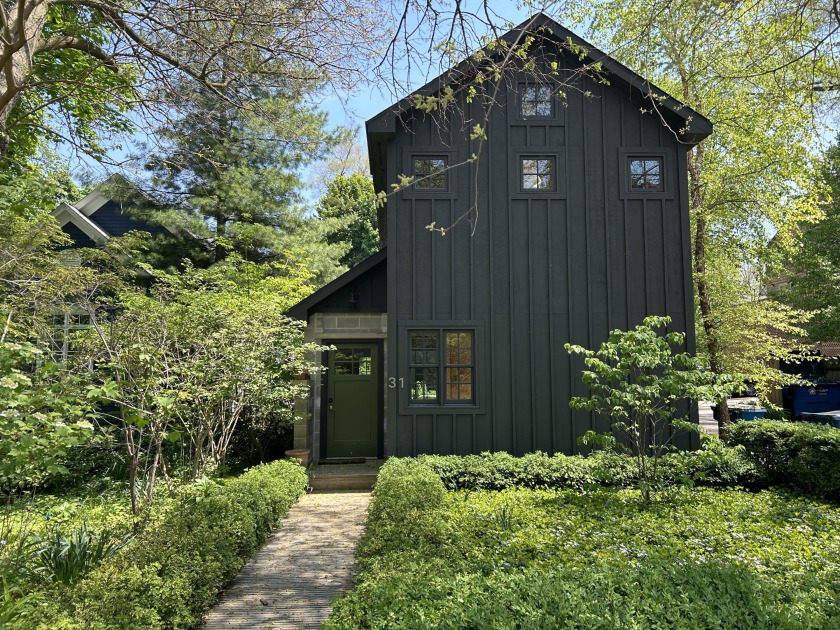 Situated in the heart of Douglas, this unique and stylish custom - Beach Home for sale in Douglas, Michigan on Beachhouse.com