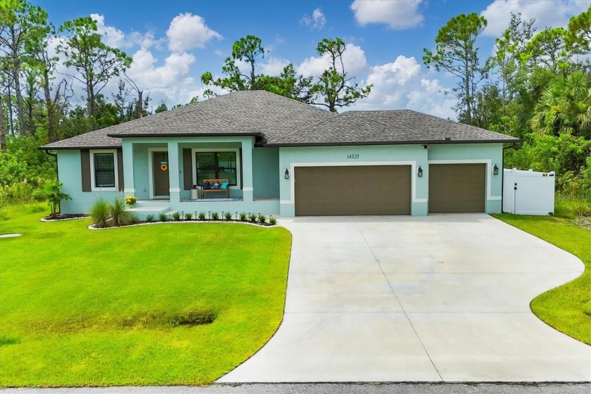 Nearly new coastal-style home with 3 bedrooms PLUS an - Beach Home for sale in Port Charlotte, Florida on Beachhouse.com