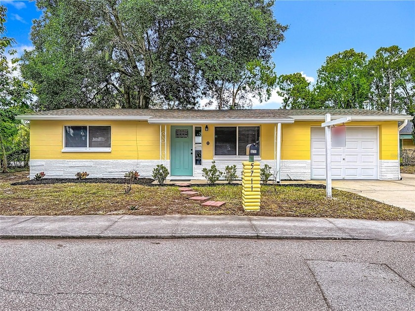 Charming and completely remodeled on oversized lot! Located just - Beach Home for sale in New Port Richey, Florida on Beachhouse.com