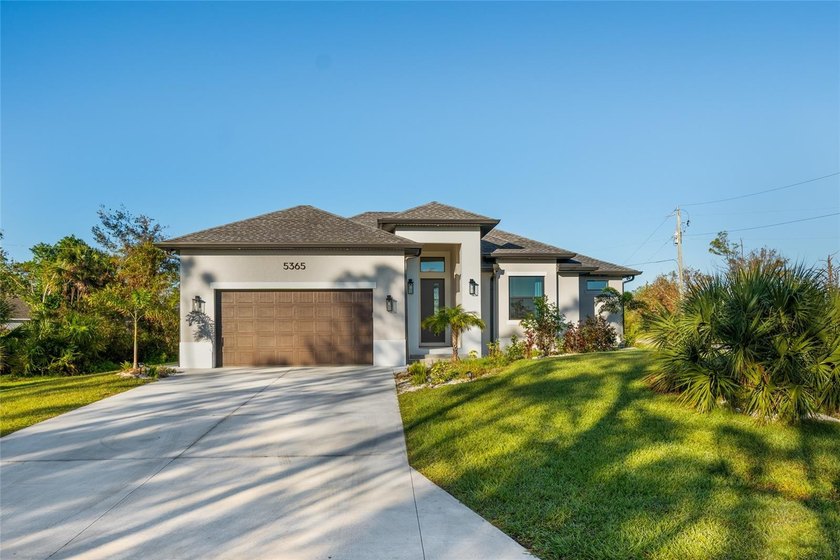 Beautifully crafted Custom home build 2024 situated on a - Beach Home for sale in Port Charlotte, Florida on Beachhouse.com