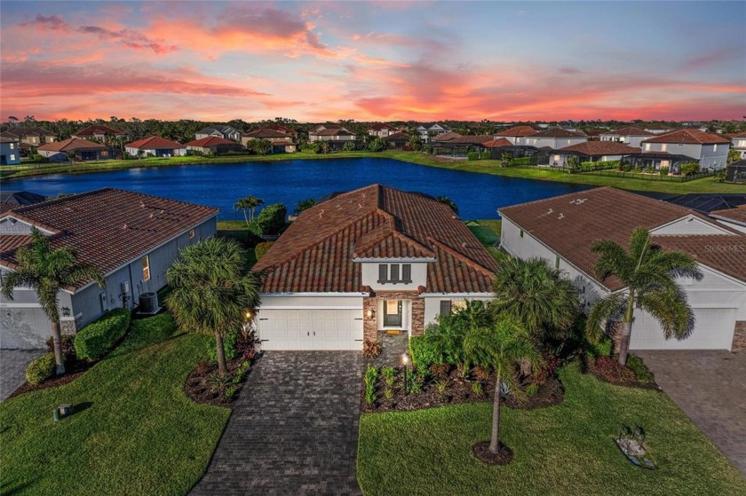 This gorgeous 4-bedroom plus study, 3-bath home features many - Beach Home for sale in Lakewood Ranch, Florida on Beachhouse.com