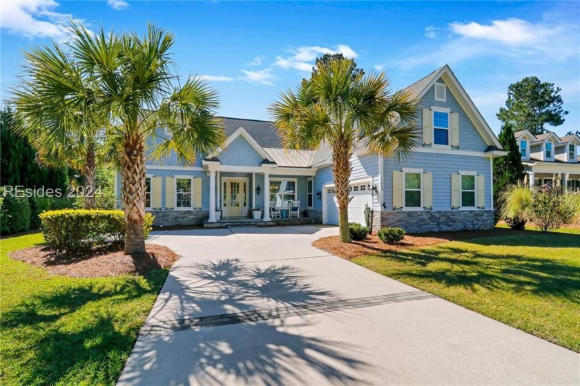 This beautiful home on the lake features 4BR, 3.5BA plus a bonus - Beach Home for sale in Bluffton, South Carolina on Beachhouse.com