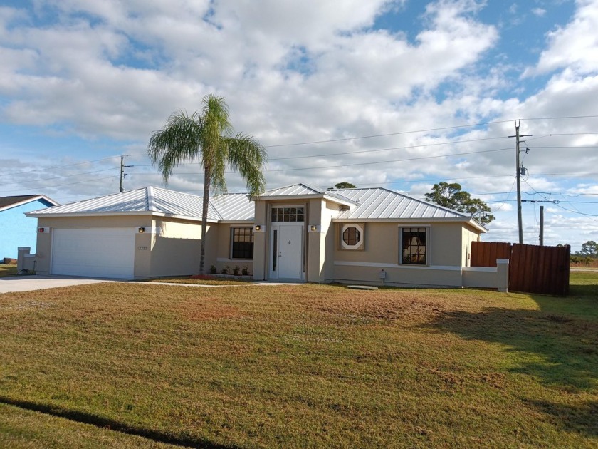 MOVE IN READY! 5 MILES TO BEACH, FENCED YARD, ACCORDIAN SHUTTERS - Beach Home for sale in Port Saint Lucie, Florida on Beachhouse.com