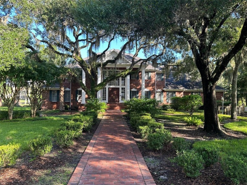 This well built brick home with lots of character is ready for - Beach Home for sale in Tampa, Florida on Beachhouse.com