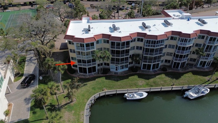 This appealing corner residence located on the second level in - Beach Condo for sale in Sarasota, Florida on Beachhouse.com