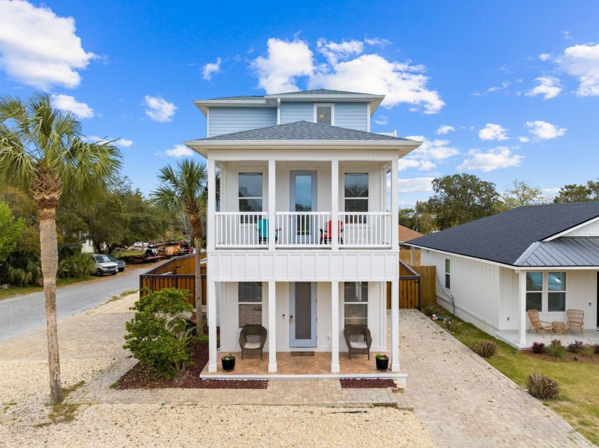 This stunning 3 story home, just two blocks from the beach - Beach Home for sale in Panama City Beach, Florida on Beachhouse.com