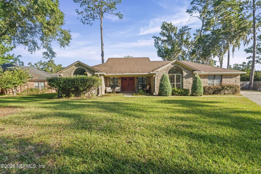 Welcome home to this beautiful brick residence tucked away in a - Beach Home for sale in Middleburg, Florida on Beachhouse.com