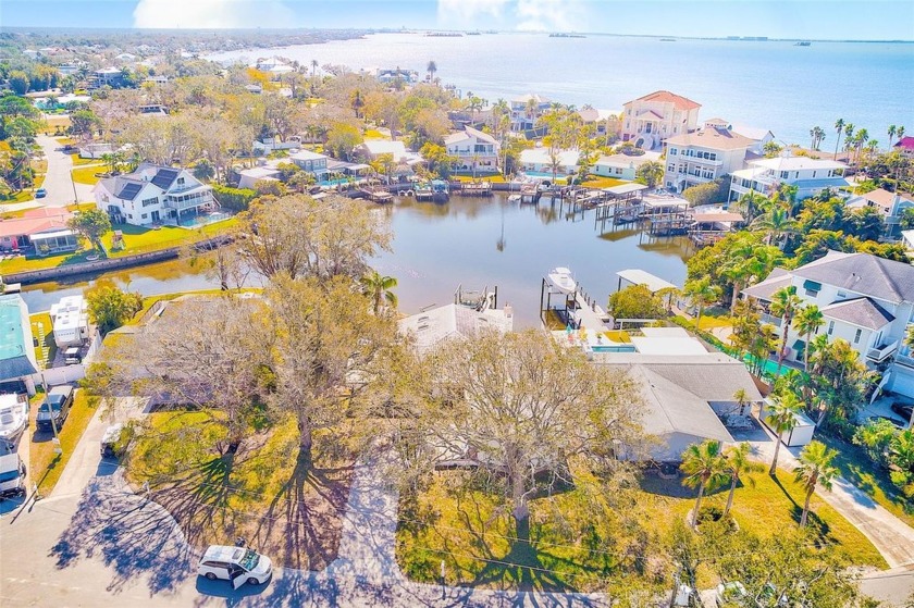 Nestled at the end of a quiet cul-de-sac, this oversized 87x125 - Beach Lot for sale in Palm Harbor, Florida on Beachhouse.com