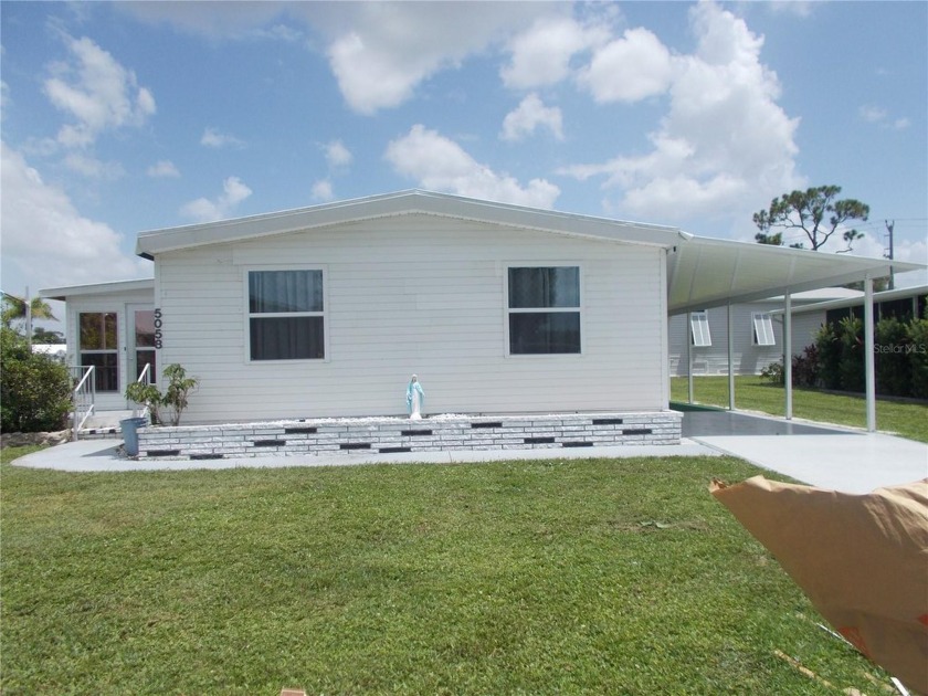 This is a furnished 2 bedroom, 2 bath doublewide home located on - Beach Home for sale in North Port, Florida on Beachhouse.com